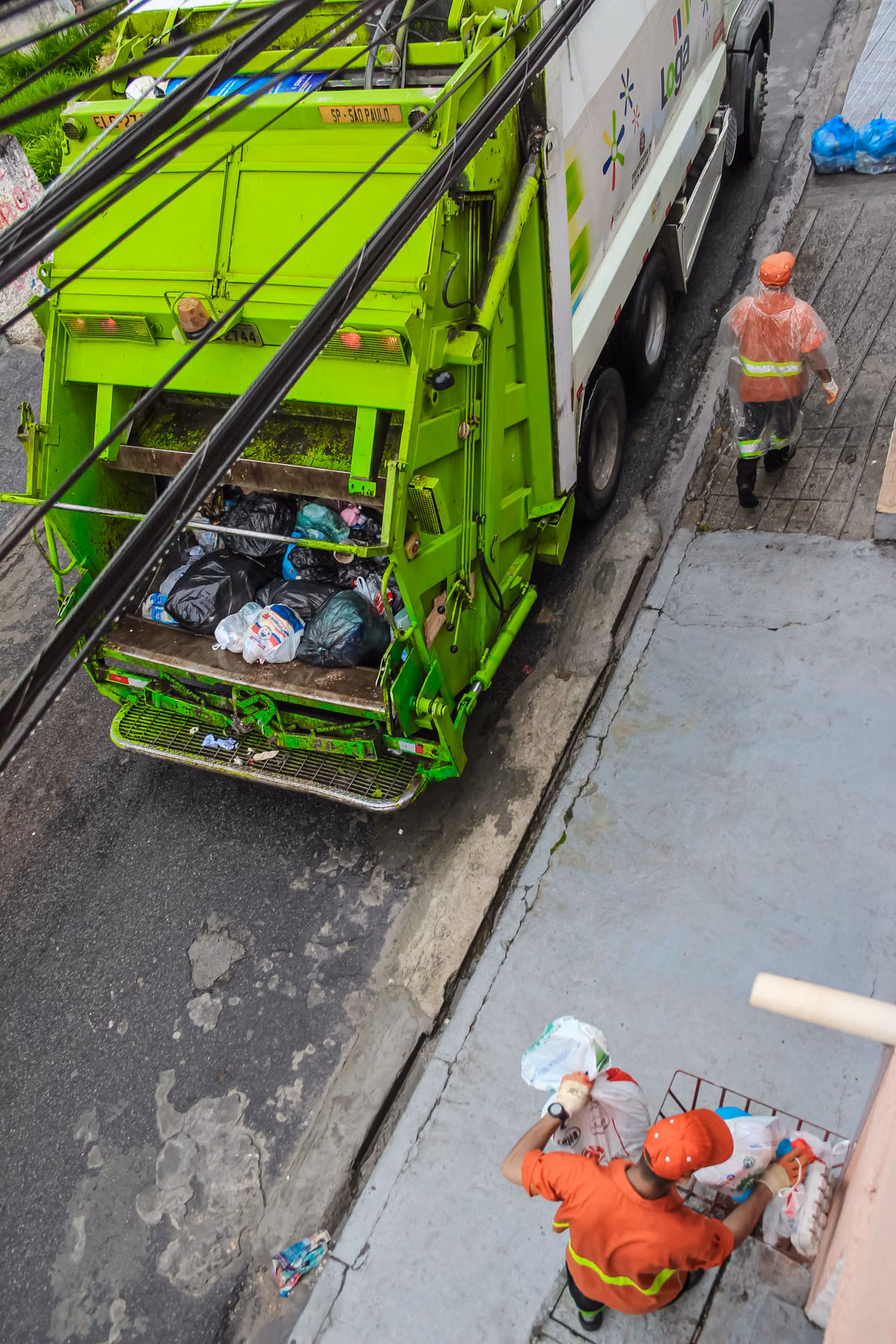 Junk removal crew loading household items near a Downtown Burlington home